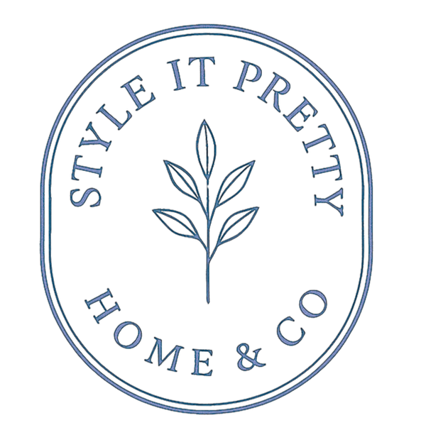 Logo of Style It Pretty Home & Co with a leaf design in the center on a white background